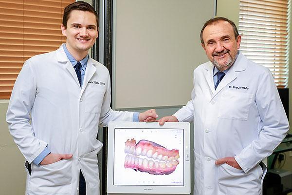 Dentists with digital scanner