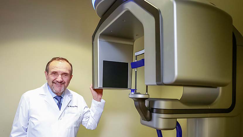 Dentist with CBCT scanner